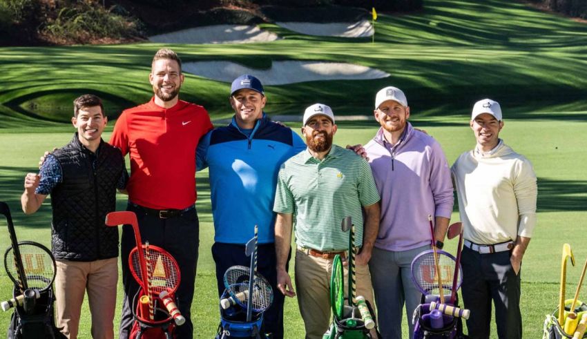 A group of men posing for a photo on a golf course.