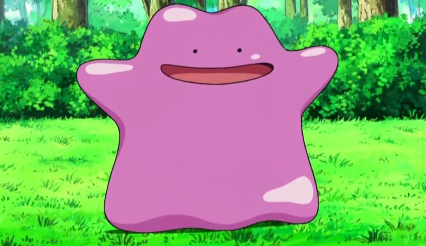 A purple pokemon standing in the grass.