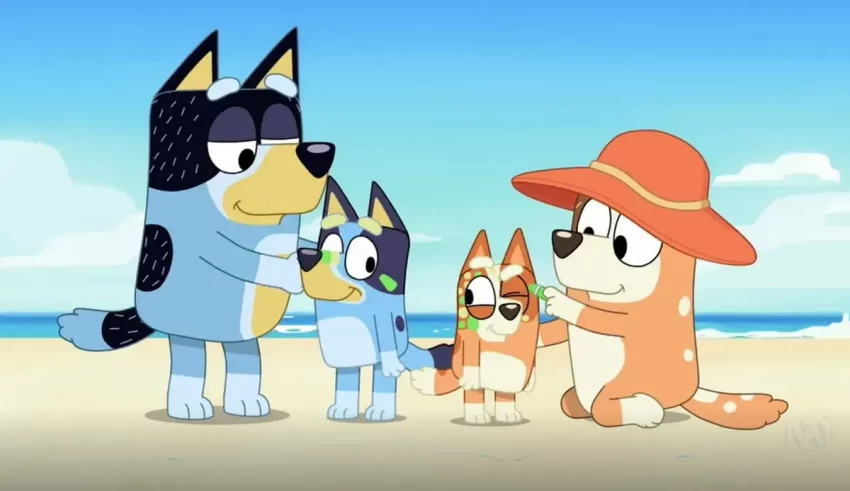 A group of cartoon animals standing on the beach.