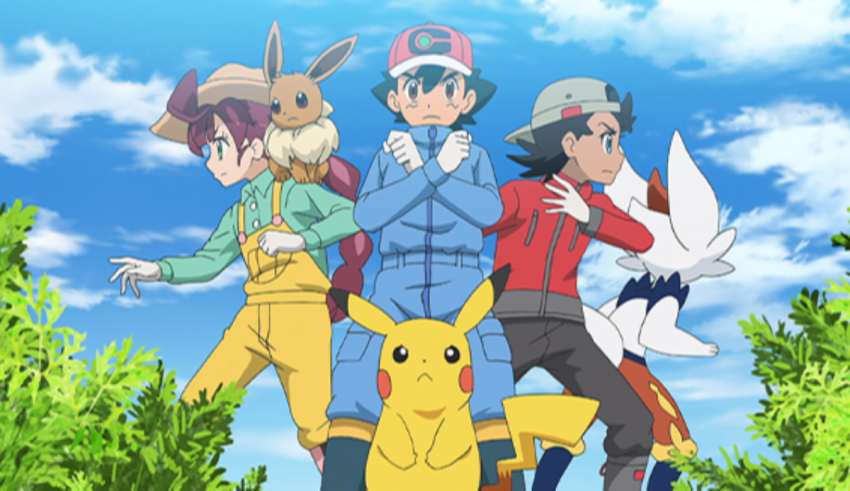 A group of pokemon characters standing in the grass.