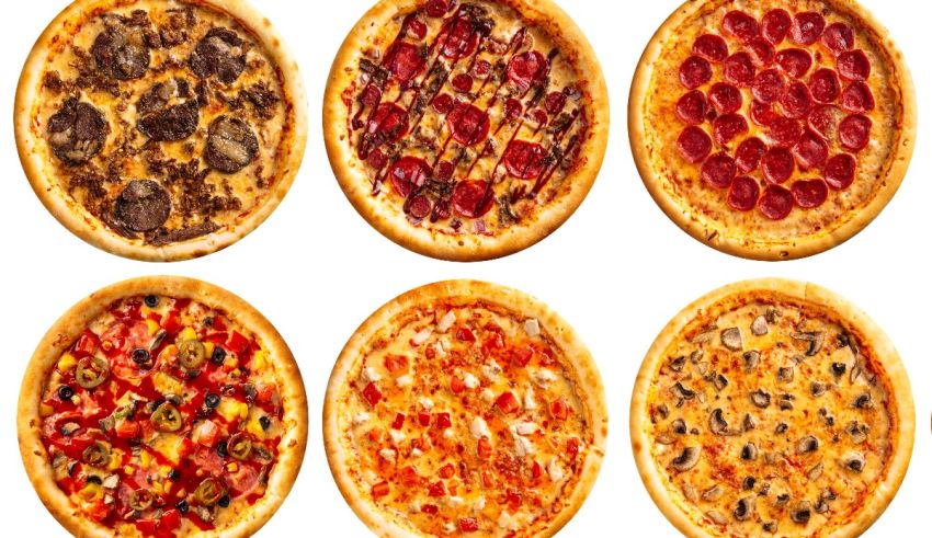 A variety of pizzas are shown on a white background.