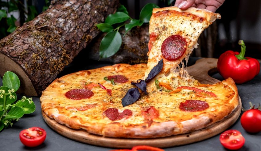 A slice of pepperoni pizza on a wooden board.