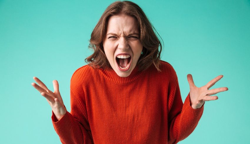 A woman is screaming on a blue background.