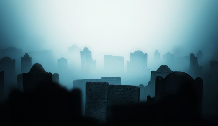 A dark city with tombstones in the background.