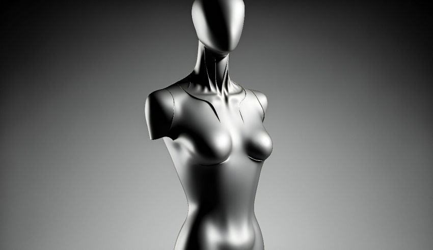 A silver mannequin mannequin on a gray background.