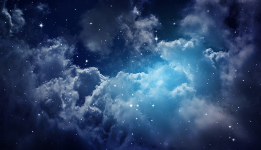 A blue sky with stars and clouds.