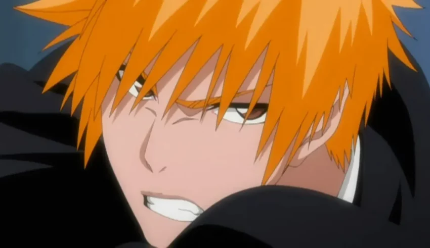 An anime character with orange hair and a black shirt.