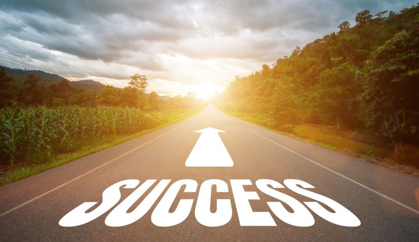 A road with the word success on it.
