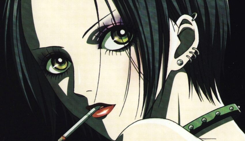 A girl with black hair and green eyes is smoking a cigarette.