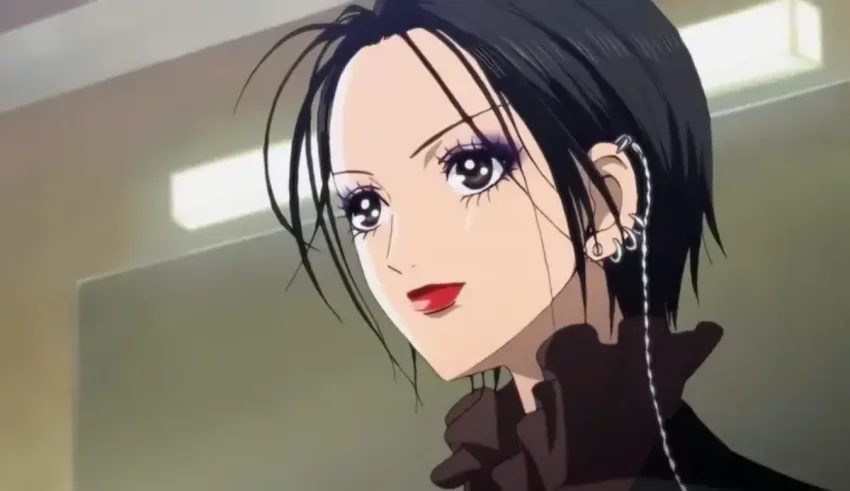 An anime girl with black hair and earrings.