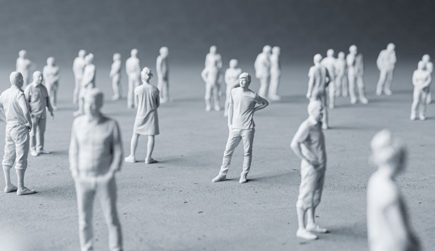 A group of white figurines standing next to each other.