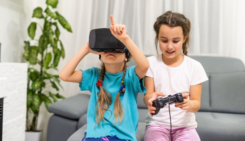 Two girls sitting on a couch with vr glasses on.