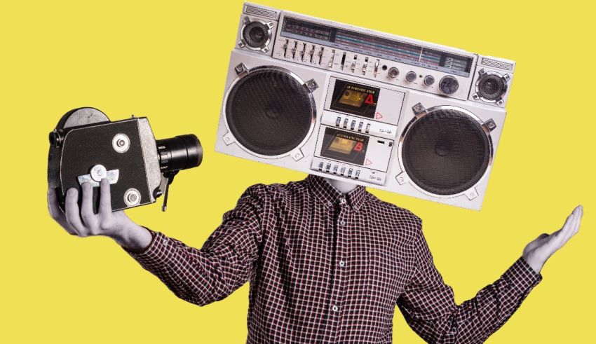A man with a boombox on his head.