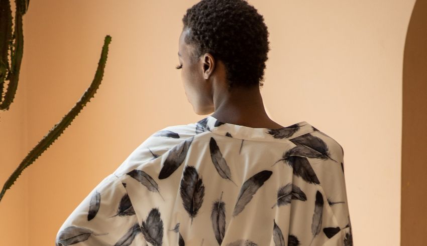 The back of a woman wearing a black and white print kimono.