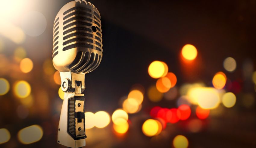 A microphone in front of a bokeh background.
