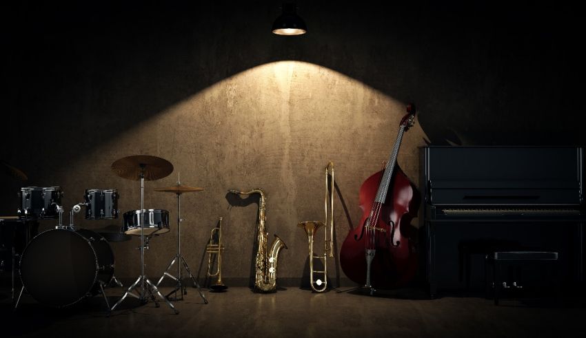 A group of musical instruments in a dark room with a spotlight.