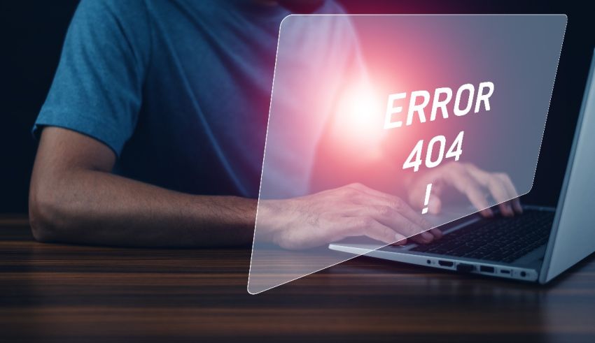 Error 404 on a laptop screen.