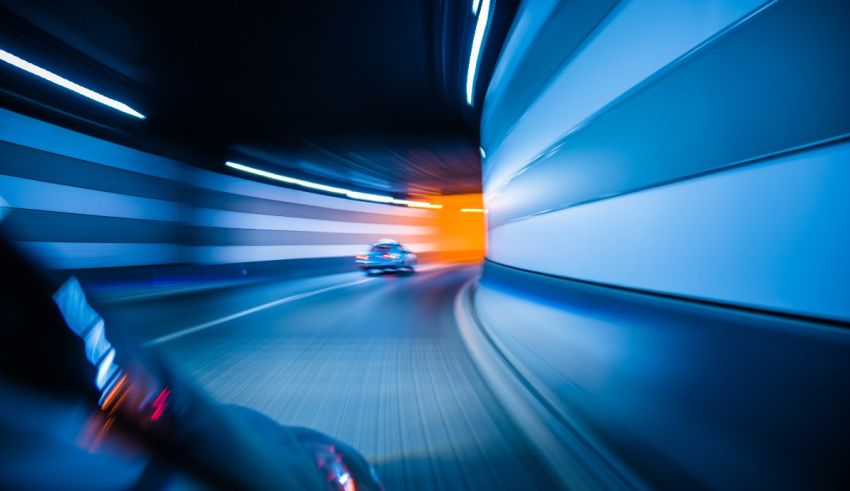 A car driving through a tunnel.